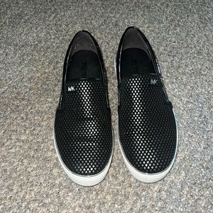 Michael Kors slip on shoes. 6